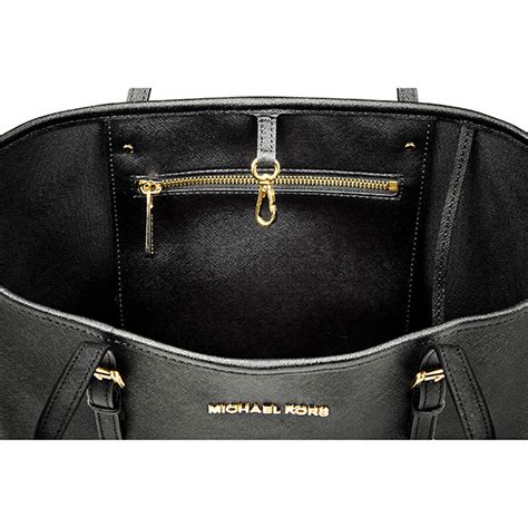 jet set travel black michael kors|Michael Kors airplane purse.